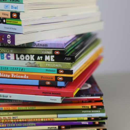 A stack of hard back books.