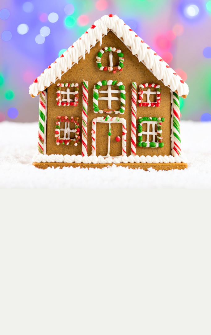 House made of gingerbread and candy on pink and purple backgroud