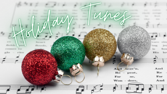 ornaments of red, green, gold and silver on music sheet